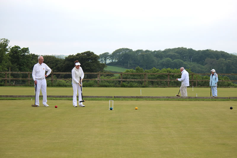 Kathryn Smith (P) runs hoop 3 with blue